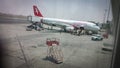 08/04/2014: Sharjah, UAE- An AirArabia flight loading in Sharjah International Airport in Sharjah, UAE