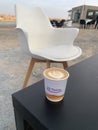 Sharjah, UAE - November 15, 2023: A cup of cortado coffee at My Space Coffee, a winter pop-up cafe, Nazwa Desert Royalty Free Stock Photo