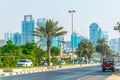 SHARJAH, UAE, OCTOBER 24, 2016: Cars are approaching center of the Sharjah emirate thourgh a busy highway