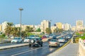 SHARJAH, UAE, OCTOBER 24, 2016: Cars are approaching center of the Sharjah emirate thourgh a busy highway