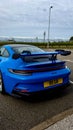 Shark Blue Porsche 911 GT3, back view, vertical