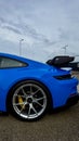 Shark Blue Porsche 911 GT3, side view, vertical