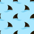 Shark Fin Silhouette Icon and Blue Waves  on Blue Background. Seamless Pattern Royalty Free Stock Photo