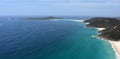 Shark Island and coastline of Shoal bay on a sunny day Royalty Free Stock Photo