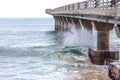 Shark Rock Pier - Concrete pier walkway over the ocean at Summerstrand Beach, Port Elizabeth, South Affica Royalty Free Stock Photo