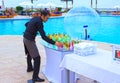 Sharm el Sheikh -April 12, 2017: hotel worker preparing cocktails at a swimming pool