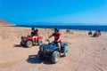 Sharm El Sheikh, Egypt - February 17, 2020: The people at quad tour in the desert in Egypt Royalty Free Stock Photo