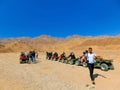 Sharm El Sheikh, Egypt - February 17, 2020: The people at quad tour in the desert in Egypt