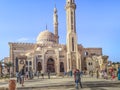 Many people pose in front of the entrance to the Al Mustafa Mosque Royalty Free Stock Photo