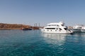 SHARM EL SHEIKH, EGYPT - JUNE 7, 2021: Tourist yachts in the bay of the Red Sea