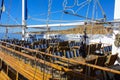 Sharm el-Sheikh, Egypt - March 14, Fragments of a yacht made of wood in the bay of the Red Sea against the blue sky Royalty Free Stock Photo