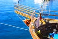 Sharm el-Sheikh, Egypt - March 14, Fragments of a yacht made of wood in the bay of the Red Sea against the blue sky Royalty Free Stock Photo