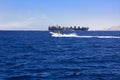 Sharm el-Sheikh, Egypt - March 14, 2018. A large cargo vessel for the transportation of containers and bulk cargoes in the open s