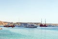 Sharm El Sheikh, Egypt May 08, 2019: Tourist pleasure boats in the harbor of Sharm El Sheikh, boarding tourists on a sea vessel