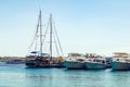 Sharm El Sheikh, Egypt May 08, 2019: Tourist pleasure boats in the harbor of Sharm El Sheikh, boarding tourists on a sea vessel