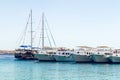 Sharm El Sheikh, Egypt May 08, 2019: Tourist pleasure boats in the harbor of Sharm El Sheikh, boarding tourists on a sea vessel