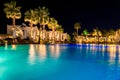 Sharm el-Sheikh, Egypt, 02/25/2019. Night landscape, interior of the hotel overlooking the pool, houses and palm trees