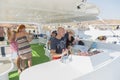 Sharm El Sheikh, Egypt. November 26 2019 Bald captain drives a pleasure boat with tourists. Happy tourists on a pleasure yacht.