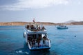 Boat with tourists near the Tiran Island