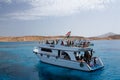 Boat with tourists near the Tiran Island