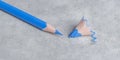 sharp blue pencil and blue pencil shavings?. Royalty Free Stock Photo