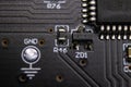 Sharp close up for ground test point next to microcontroller Royalty Free Stock Photo