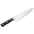 High quality santoku chef knife with black handle ideal for kitchen tasks Royalty Free Stock Photo