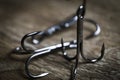 Sharp fish hooks photographed close-up. Sharpened hook will not give a chance to fish to escape from the fisherman. Royalty Free Stock Photo