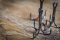 Sharp fish hooks photographed close-up. Sharpened hook will not give a chance to fish to escape from the fisherman. Royalty Free Stock Photo