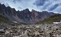 Sharp fragments of rock on background of a mountain range. Eastern Sayan. The Republic of Buryatia