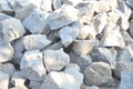 Sharp gray stones in pile for construction