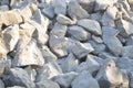 Sharp gray stones in pile for construction