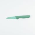 Green knife on white background