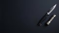 Knife and flashlight on dark background Royalty Free Stock Photo
