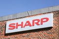 Sharp logo on a facade Royalty Free Stock Photo