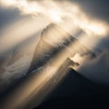 Sharp mountain peaks are illuminated by Royalty Free Stock Photo