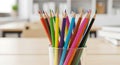 Sharp multicolored pencils on a clean desk Royalty Free Stock Photo