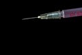 Syringe, injection needle on black background Royalty Free Stock Photo