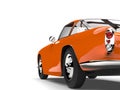 Sharp orange vintage muscle car - rear view closeup cut shot Royalty Free Stock Photo
