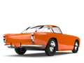 Sharp orange vintage muscle car - rear view Royalty Free Stock Photo