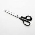 Sharp, professional scissors with sleek black handles poised for precise cutting on a clean white background, perfect for crafting Royalty Free Stock Photo