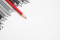 Sharp red color pencil stand out of other pencils Royalty Free Stock Photo