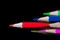 Sharp red pencil in focus, conceptual leadership image Royalty Free Stock Photo