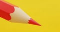 Extreme Close Up of a Red Pencil Tip on a Vibrant Yellow Background image photo Royalty Free Stock Photo