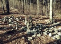 Sharp stones stacked in fall Forest . Autumn morning Royalty Free Stock Photo