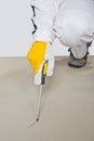 Sharp tool checking cement floor Royalty Free Stock Photo