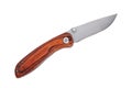 Sharp Tourist folding knife with a wooden handle Royalty Free Stock Photo