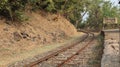 Sharp turns on narrow gauge rail network. Railway track laid down in the dense forest of India.