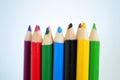 Sharped colored pencils on white background for art drawing Royalty Free Stock Photo