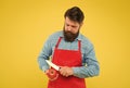 Sharpen your knife skills. Bearded man cut tomato with slicing knife. Tomato slicing. Cooking vegetarian food. Vegetable Royalty Free Stock Photo